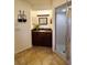 Modern bathroom with granite vanity, shower, and tiled flooring at 509 Clearview Dr, Port Charlotte, FL 33953