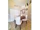 Bright dining area with round table and four upholstered chairs at 509 Clearview Dr, Port Charlotte, FL 33953