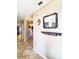 Bright hallway with tiled floors and modern wall decor at 509 Clearview Dr, Port Charlotte, FL 33953