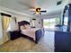 Bright main bedroom with water view, king-size bed, and ample dresser space at 509 Clearview Dr, Port Charlotte, FL 33953