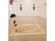 Relaxing bathroom with jacuzzi tub and tiled walls at 509 Clearview Dr, Port Charlotte, FL 33953