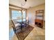 Charming breakfast nook with a round table and four chairs at 509 Clearview Dr, Port Charlotte, FL 33953