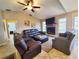Spacious living room with a fireplace and reclining furniture at 509 Clearview Dr, Port Charlotte, FL 33953