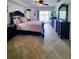 Comfortable bedroom with a queen-size bed and dark wood furniture at 509 Clearview Dr, Port Charlotte, FL 33953