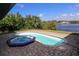 Private spa adjacent to the pool, perfect for relaxation at 509 Clearview Dr, Port Charlotte, FL 33953
