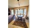 Bright breakfast nook boasts a window seat and wood hutch at 509 Clearview Dr, Port Charlotte, FL 33953