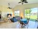 Spacious living area with lake view and dining area at 24025 Canal St, Punta Gorda, FL 33980