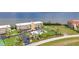 Aerial shot of waterfront condo community with pool and tennis court at 101 N Marion Ct # 122, Punta Gorda, FL 33950