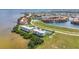 Stunning waterfront condo featuring a tennis court, lush landscaping, and breathtaking views at 101 N Marion Ct # 122, Punta Gorda, FL 33950