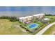 Gorgeous waterfront condo featuring a tennis court, lush landscaping, and breathtaking bay views at 101 N Marion Ct # 122, Punta Gorda, FL 33950