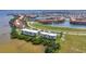 Beautiful waterfront condo featuring a tennis court, lush landscaping and community views at 101 N Marion Ct # 122, Punta Gorda, FL 33950