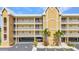 Close up of the condo showing the structure and parking at 101 N Marion Ct # 122, Punta Gorda, FL 33950