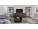 Living room with sectional sofa and two armchairs at 14640 Sycamore Ct # 2822, Punta Gorda, FL 33955