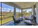 Relaxing screened porch overlooking a lush golf course at 14640 Sycamore Ct # 2822, Punta Gorda, FL 33955