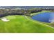 Golf course with water features and lush greens at 14640 Sycamore Ct # 2822, Punta Gorda, FL 33955