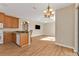 Kitchen with island and view into living room at 2262 Rio De Janeiro Ave, Punta Gorda, FL 33983