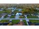 Aerial view showcasing a house's location within a community at 91 Mark Twain Ln, Rotonda West, FL 33947