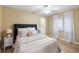 Cozy bedroom with double bed, nightstand, and ample closet space at 91 Mark Twain Ln, Rotonda West, FL 33947