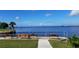 Scenic waterfront view with benches and calm waters at 25188 Marion Ave # E301, Punta Gorda, FL 33950