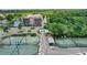 Two tennis courts with covered seating areas at 25188 Marion Ave # E301, Punta Gorda, FL 33950