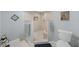 Updated bathroom with walk-in shower and toilet at 25188 Marion Ave # E301, Punta Gorda, FL 33950