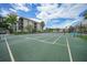 Well-maintained tennis and pickleball courts at 25188 Marion Ave # E301, Punta Gorda, FL 33950