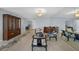 Condo living room with hardwood floors and Asian-inspired furniture at 25188 Marion Ave # E301, Punta Gorda, FL 33950