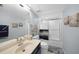 Clean bathroom with tub and shower, vanity and mirror at 25188 Marion Ave # E301, Punta Gorda, FL 33950