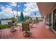 Community patio area with seating, overlooking the marina at 25188 Marion Ave # E301, Punta Gorda, FL 33950