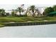 Scenic view of a peaceful lake and golf course at 24312 Westgate Blvd, Port Charlotte, FL 33980