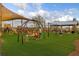 Community playground with swings, slides, and shade structures at 43050 Greenway Blvd # 645, Punta Gorda, FL 33982