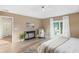 Bright bedroom with ensuite access and sitting area at 91 Mark Twain Ln, Rotonda West, FL 33947