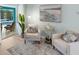 Relaxing sitting area with French doors opening to the pool at 91 Mark Twain Ln, Rotonda West, FL 33947