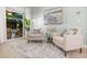 Cozy sitting area with access to pool view at 91 Mark Twain Ln, Rotonda West, FL 33947