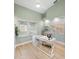 Bright and airy home office with a world map accent at 91 Mark Twain Ln, Rotonda West, FL 33947