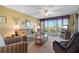 Relax in this living room with ample natural light at 25188 Marion Ave # B304, Punta Gorda, FL 33950