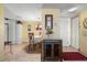 Bright dining area with a table, chairs, and access to the kitchen at 25188 Marion Ave # B304, Punta Gorda, FL 33950
