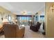 Living room with comfortable seating and views of the ocean at 25188 Marion Ave # B304, Punta Gorda, FL 33950