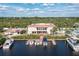 Community clubhouse with marina, pool, and boat docks at 25188 Marion Ave # B304, Punta Gorda, FL 33950