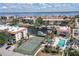 Aerial view of community pool and tennis courts at 25188 Marion Ave # B304, Punta Gorda, FL 33950