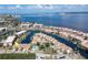 Waterfront condo building with pool and parking at 25188 Marion Ave # B304, Punta Gorda, FL 33950