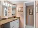 Bathroom with granite countertop and double vanity at 25188 Marion Ave # B304, Punta Gorda, FL 33950