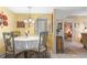 Bright dining area with table and chairs, perfect for intimate meals at 25188 Marion Ave # B304, Punta Gorda, FL 33950
