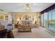 Bright and airy living room with water views at 25188 Marion Ave # B304, Punta Gorda, FL 33950