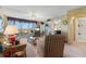 Bright living room with balcony access and ocean view at 25188 Marion Ave # B304, Punta Gorda, FL 33950