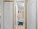 View of bathroom from hallway at 25188 Marion Ave # B304, Punta Gorda, FL 33950