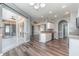 Open kitchen with access to the backyard and dining area at 1858 Norvell Ave, North Port, FL 34286