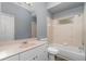 Clean bathroom with tub, toilet and sink at 1858 Norvell Ave, North Port, FL 34286