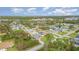 Aerial view of community, showcasing homes and streets at 1858 Norvell Ave, North Port, FL 34286