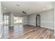 Spacious living area with sliding glass doors leading to the backyard at 1858 Norvell Ave, North Port, FL 34286
